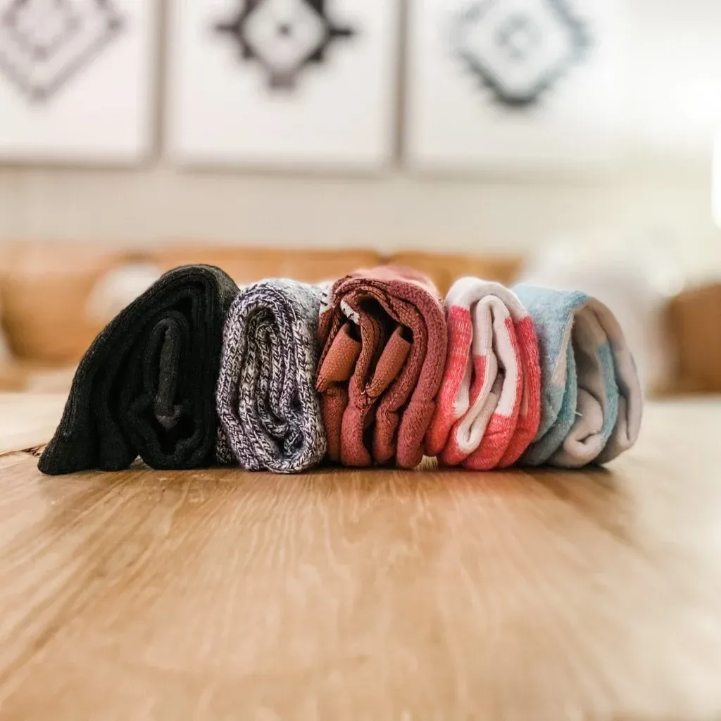 Socks folded and standing in a row